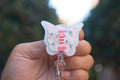 Blue Butterfly with Bows and Roses Badge Reel