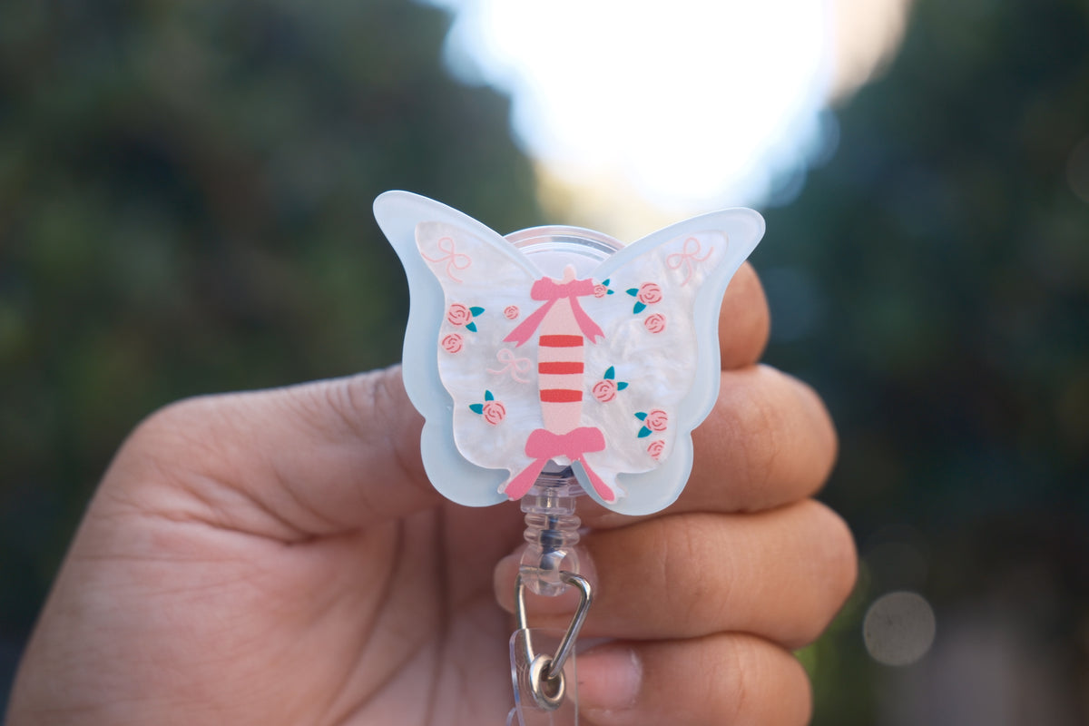 Blue Butterfly with Bows and Roses Badge Reel