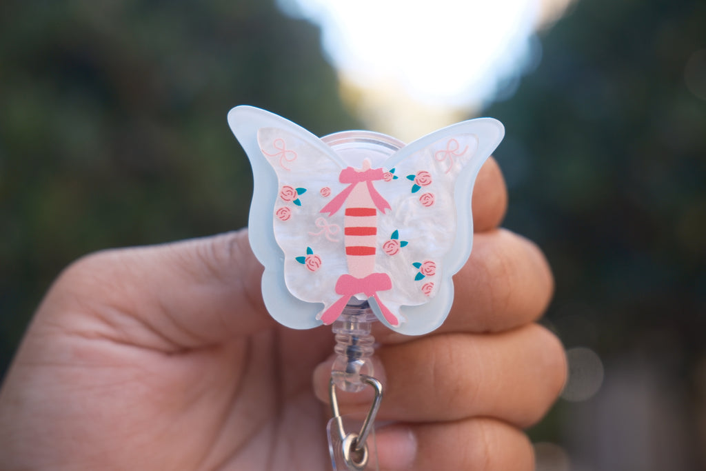 Blue Butterfly with Bows and Roses Badge Reel