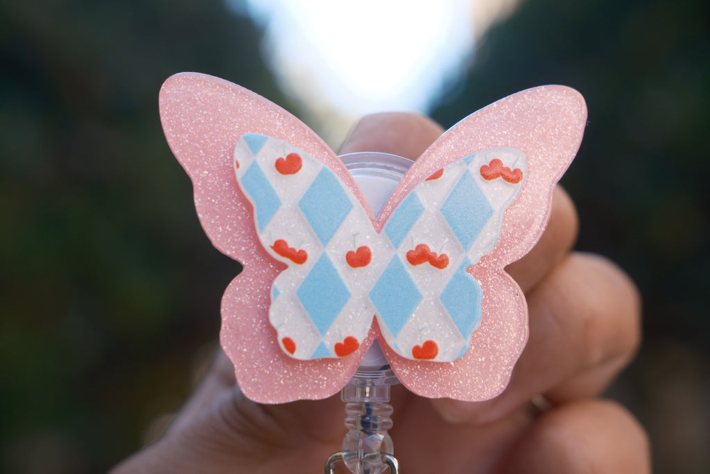 Pink Butterfly with Cherry Accent Badge Reel
