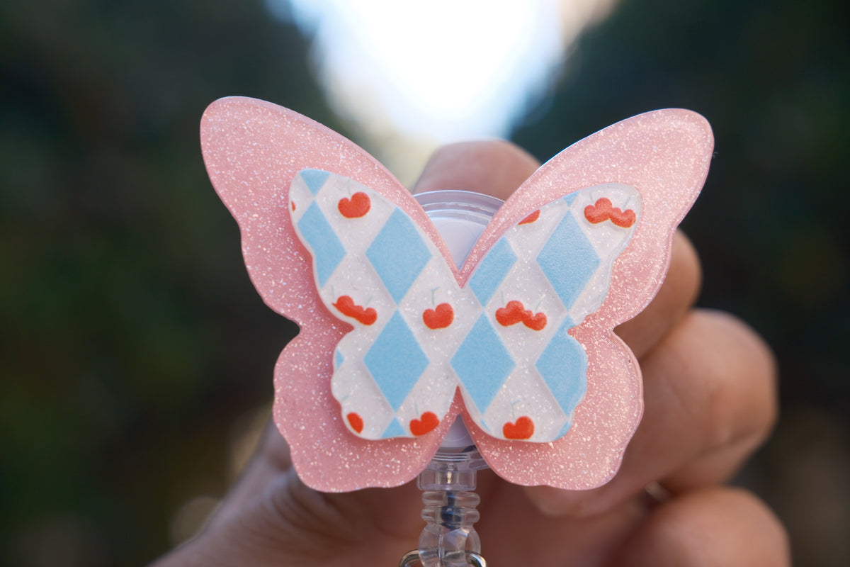 Pink Butterfly with Cherry Accent Badge Reel